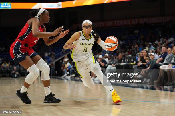 Allisha Gray of the Dallas Wings drives to the basket against the Washington Mystics on May 17, 2022 at College Park Center in Arlington, TX. NOTE TO...