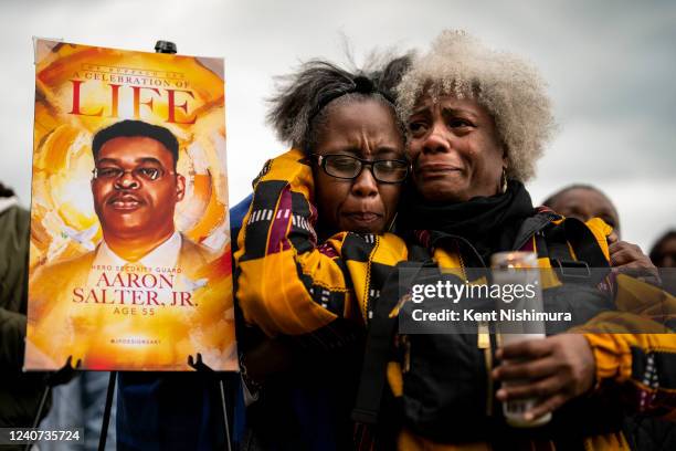 Janate Ingram, and Cariol Horne, both of Buffalo, attend a vigil across the street from Tops Friendly Market at Jefferson Avenue and Riley Street on...