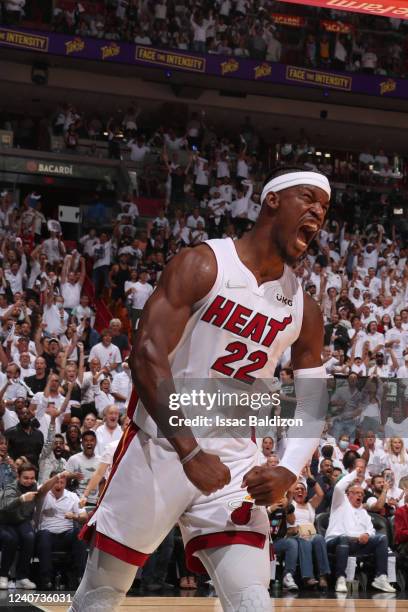 Jimmy Butler of the Miami Heat reacts to a play during Game 1 of the 2022 NBA Playoffs Eastern Conference Finals against the Boston Celtics on May...