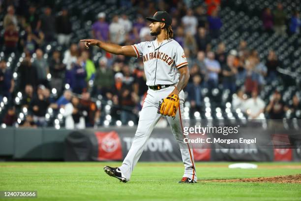 Camilo Doval of the San Francisco Giants pitches against the Colorado Rockies during the ninth inning at Coors Field on May 17, 2022 in Denver,...
