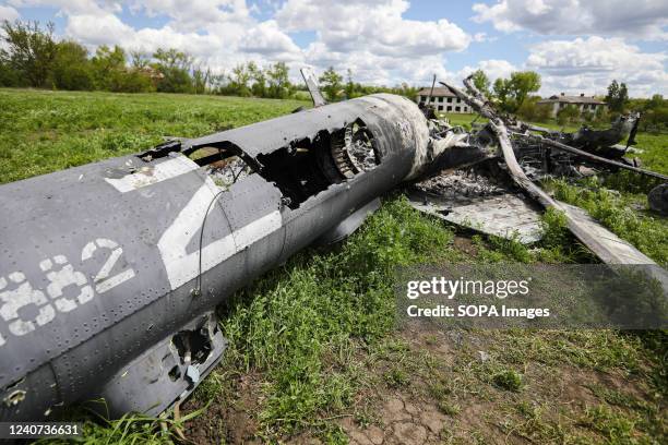 Letter "Z" is seen on a burnt, destroyed Russian helicopter in Biskvitne. Ukrainian and Western officials say Russia is withdrawing forces around...