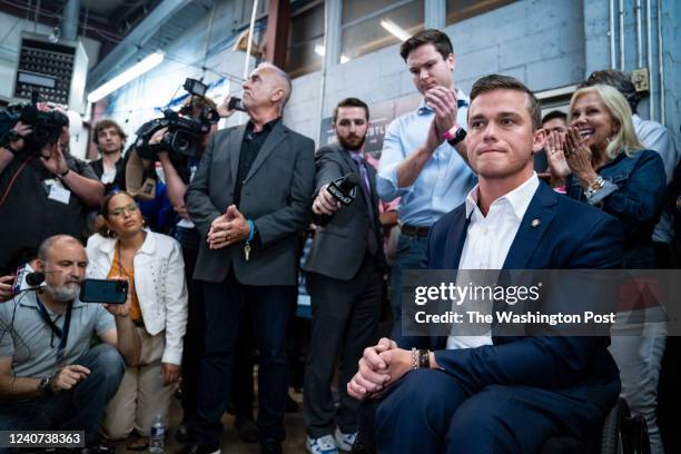 Hendersonville, NC Rep. Madison Cawthorn, R-N.C., talks with reporters and supporters as results from the North Carolina primary election continue to...