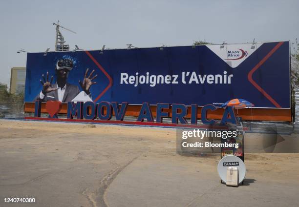 Canal+ satellite television kiosk in front of an advertising billboard for Moov Africa BV in N'Djamena, Chad, on Friday, May 13, 2022. Last year,...
