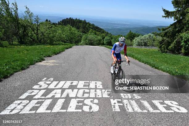 Groupama-FDJ's French rider Thibaut Pinot climbs the hill during a training session at La planche des belles filles, in Plancher-les-Mines, eastern...