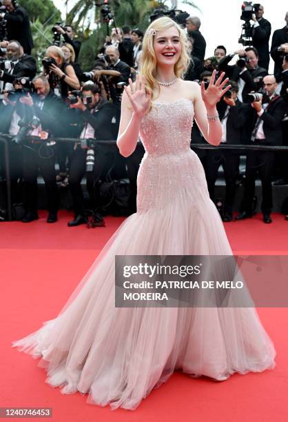 Actress Elle Fanning arrives for the screening of the film "Top Gun : Maverick" during the 75th edition of the Cannes Film Festival in Cannes,...