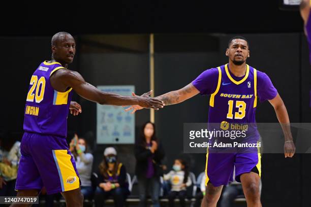Andre Ingram high fives Mason Jones of the South Bay Lakers during the game against the Oklahoma City Blue on November 20, 2021 at UCLA Heath...