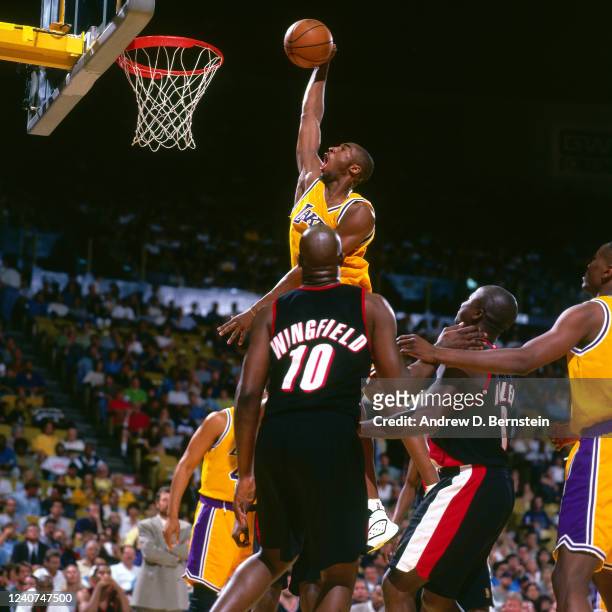 Kobe Bryant of the Los Angeles Lakers drives to the basket against the Portland Trail Blazers on April 27, 1997 at the Great Western Forum in...