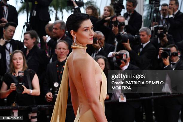 Model Grace Elizabeth arrives for the screening of the film "Top Gun : Maverick" during the 75th edition of the Cannes Film Festival in Cannes,...