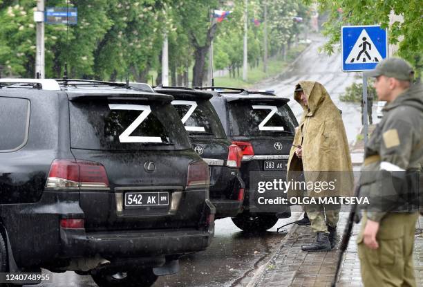 Cars of the motorcade of Denis Pushilin, leader of the separatists in the self-proclaimed Donetsk People's Republic , adorned with the letter Z are...