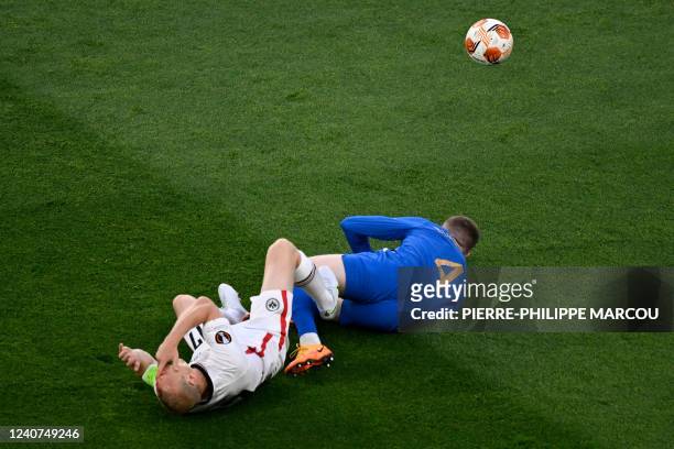 Frankfurt's German midfielder Sebastian Rode reacts after being injured after colliding with Rangers' English midfielder John Lundstram during the...