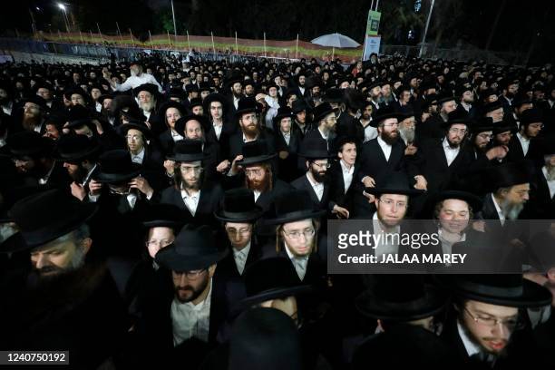 Ultra-Orthodox Jews gather at the gravesite of Rabbi Shimon Bar Yochai at Mount Meron in northern Israel May 18 as they celebrate the Jewish holiday...