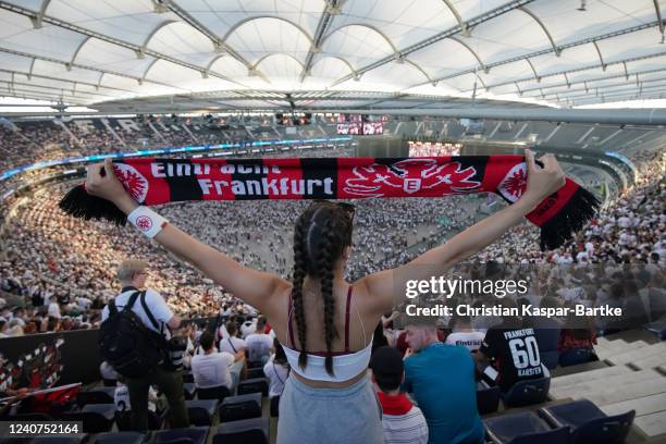 Fans of Eintracht Frankfurt watch their team play Rangers FC in the UEFA Europa League Final 2021/22 at Deutsche Bank Park on May 18, 2022 in...