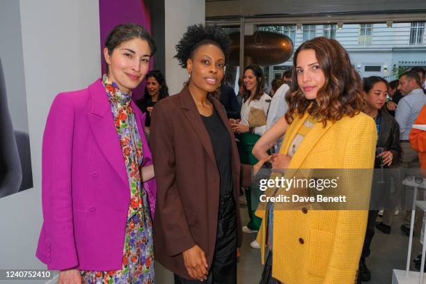 Caroline Issa, Donna Wallace and Racil Chalhoub attend the AKONI x Carolina Issa immersive gallery experience in the TANK space on May 18, 2022 in...