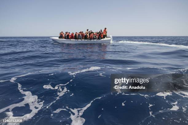 Migrant boat in distress seen in the Maltese SAR zone offshore Malta on May 17, 2022. The crew of Astral sailboat, of the Spanish NGO Open Arms,...