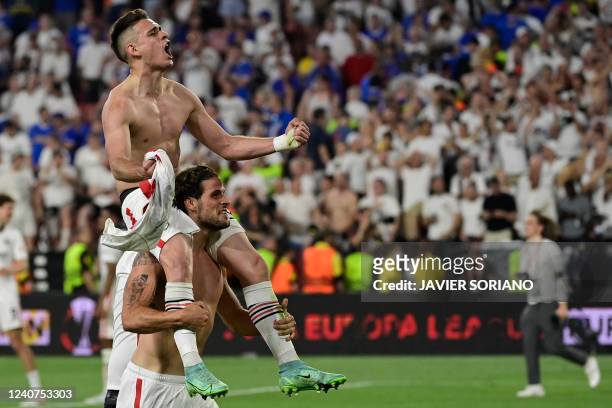 Frankfurt's Colombian striker Rafael Borre and Frankfurt's Portuguese striker Goncalo Paciencia celebrate after winning the UEFA Europa League final...