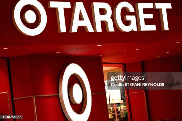 The logo is displayed on a Target store in Washington, DC, on May 18, 2022. - With European markets also in retreat, major US indices took cues from...