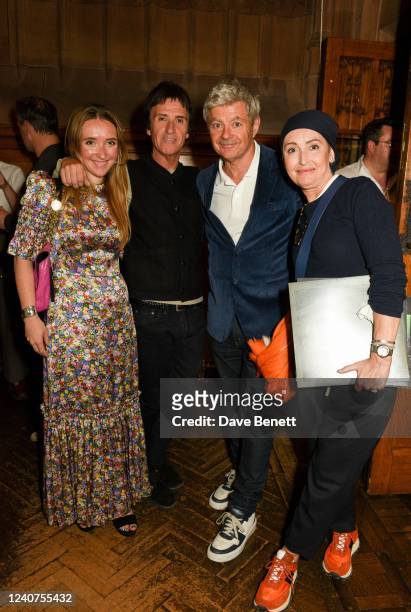 Sonny Marr, Johnny Marr, Alan Edwards and Angie Marr attend the British Pop Archive and the launch of its first exhibition 'Collection' at the John...