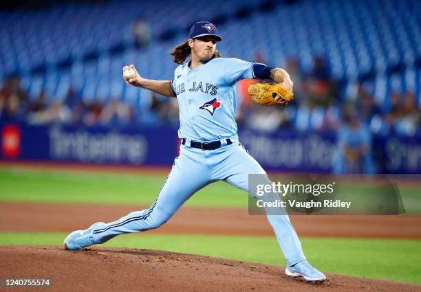 Kevin Gausman of the Toronto Blue Jays delivers a pitch in the first inning during a MLB game against the Seattle Mariners at Rogers Centre on May...