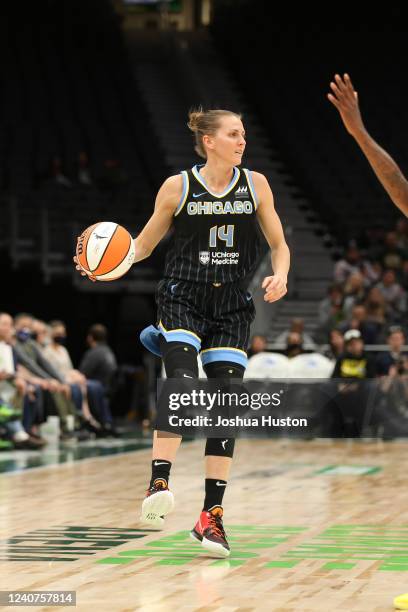 Allie Quigley of the Chicago Sky dribbles the ball during the game against the Seattle Storm on May 18, 2022 at Climate Pledge Arena on May 18, 2022...