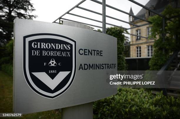 This general view taken on May 19 shows a sign with a logo in front of the chateau of FC Girondins de Bordeaux at the club's training ground in Le...