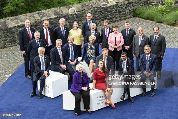 Finance ministers and central bankers from the Group of Seven industrialised nations pose for a group photo on May 19, 2022 at the Petersberg in...