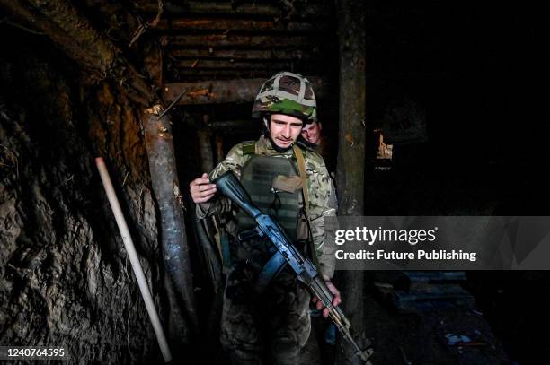 Soldiers stay in a dugout as the 3rd fortification line aimed at protecting Zaporizhzhia is in the final stage of construction, Zaporizhzhia Region,...