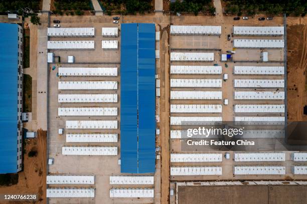 View of a new Covid-19 isolation camp under construction in Huaxian county in Henan province Saturday, May 14, 2022. China has asked the local...