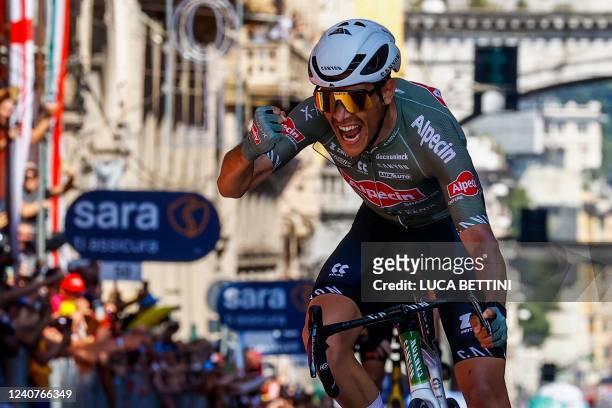 Team Alpecin-Fenix Italian rider Stefano Oldani celebrates as he crosses the finish line to win the 12th stage of the Giro d'Italia 2022 cycling...