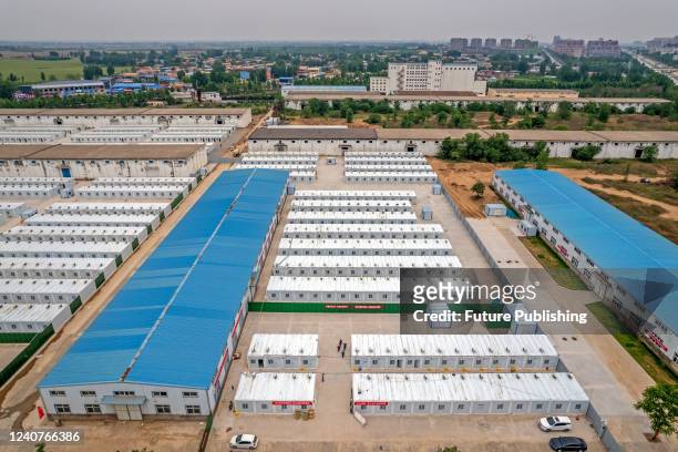 View of a new Covid-19 isolation camp under construction in Huaxian county in Henan province Saturday, May 14, 2022. China has asked the local...