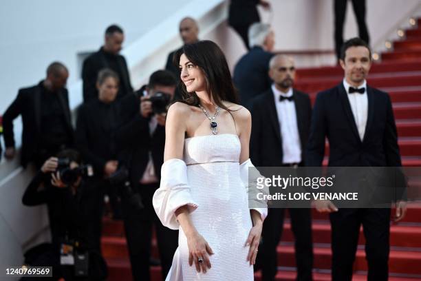 Actress Anne Hathaway poses as she arrives for the screening of the film "Armageddon Time" during the 75th edition of the Cannes Film Festival in...