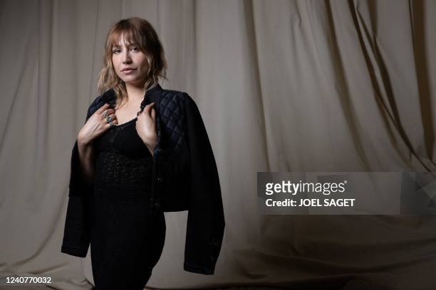 French singer Izia Higelin poses during a photo session in La Frette-sur-Seine, north of Paris, on May 18, 2022.