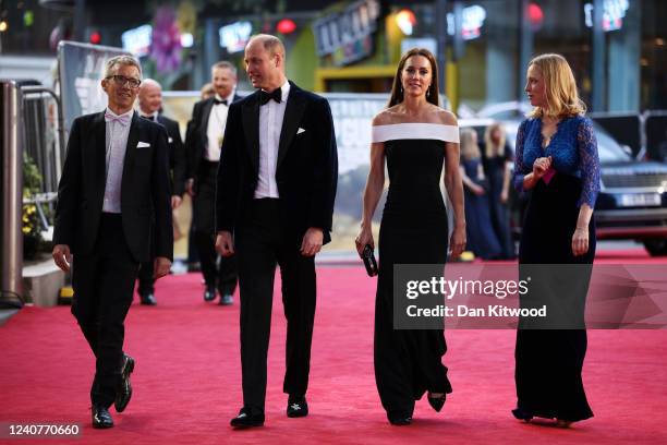 Prince William, Duke of Cambridge and Catherine, Duchess of Cambridge arrive with Cameron Saunders and Alex Pumfrey of the Film and TV Charity for...