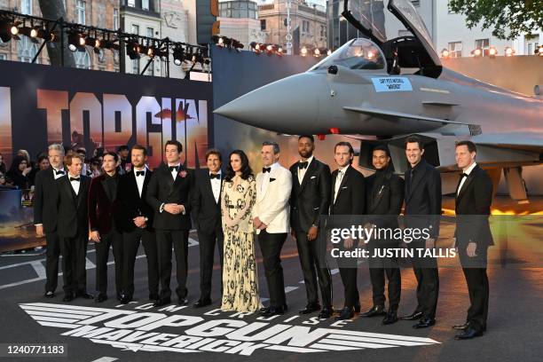 Members of the cast pose upon arrival for the UK premiere of the film "Top Gun: Maverick" in London, on May 19, 2022.