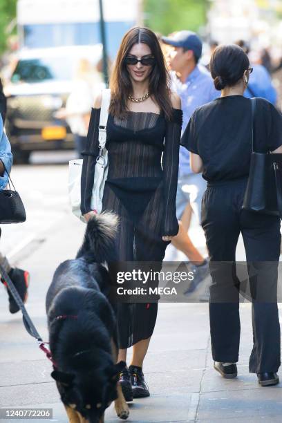 Emily Ratajkowski is seen out for a walk on May 18, 2022 in New York, New York.