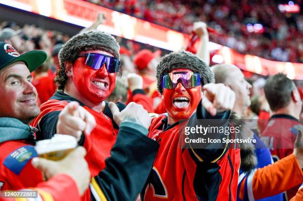 Calgary Flames fans celebrate a goal by their team during the third period of game 1 of the second round of the NHL Stanley Cup Playoffs between the...