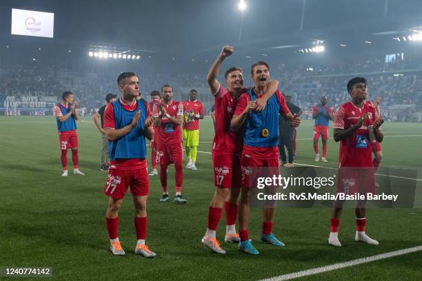 Sion players celebrate the win with fans after the Super League match between FC Lausanne-Sport and FC Sion at Stade de la Tuiliere on May 19, 2022...