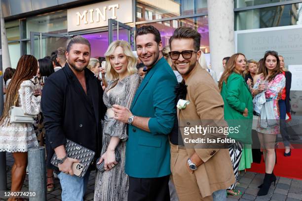 Justus Toussis, Svenja Simmons, Luca Simmons and Luca Bazanella during the opening of Germany's first dental spa by celebrity doctor Mariana...