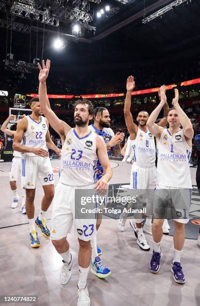 Sergio Llull, #23, Fabien Causeur, #1, Walter Tavares, #22 and Adam Hanga, #8of Real Madrid celebrate victory after the 2022 Turkish Airlines...