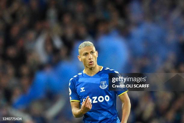 Everton's Brazilian striker Richarlison celebrates after scoring his team second goal during the English Premier League football match between...