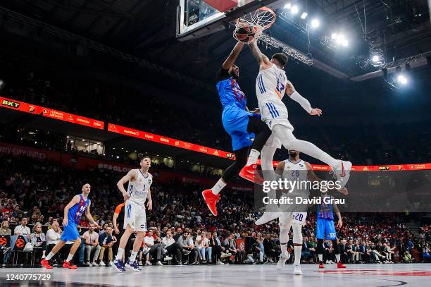 Brandon Davies, #0 of FC Barcelona competes with Vincent Poirier, #17 of Real Madrid during the 2022 Turkish Airlines EuroLeague Final Four Belgrade...
