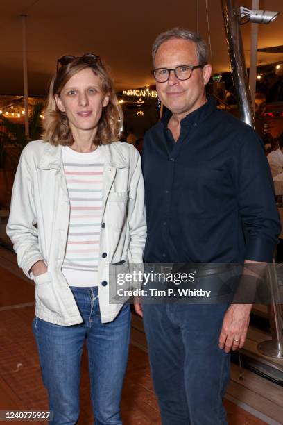 Mia Hansen-Løve and Bobby Allen attend the MUBI & The Match Factory dinner and drinks to celebrate the 75th Cannes Film Festival on May 19, 2022 in...