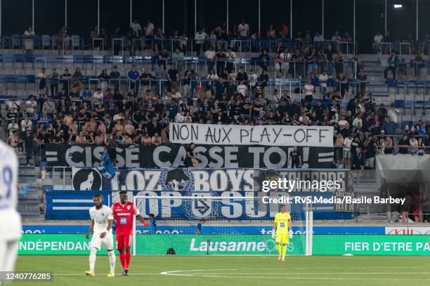 Lausanne-Sport display a banner during the Super League match between FC Lausanne-Sport and FC Sion at Stade de la Tuiliere on May 19, 2022 in...