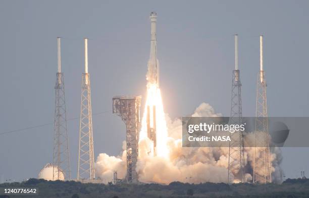 In this handout photo provided by NASA, a United Launch Alliance Atlas V rocket with Boeings CST-100 Starliner spacecraft launches from Space Launch...