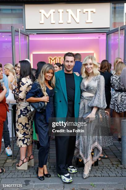 Gitta Banko, Luca Simmons, Svenja Simmons during the opening of Germany's first dental spa by celebrity doctor Mariana Mintcheva on May 19, 2022 in...