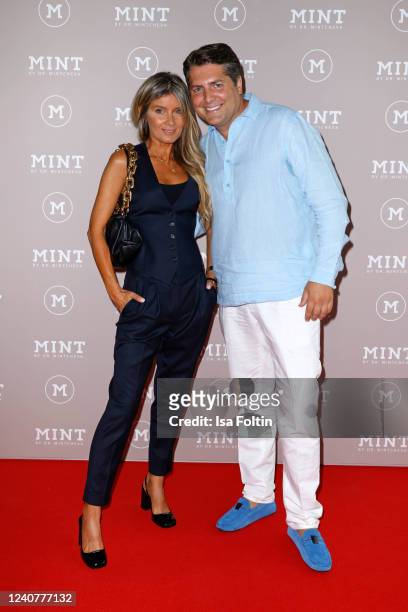 Gitta Banko and Baptiste Pawlik during the opening of Germany's first dental spa by celebrity doctor Mariana Mintcheva on May 19, 2022 in...