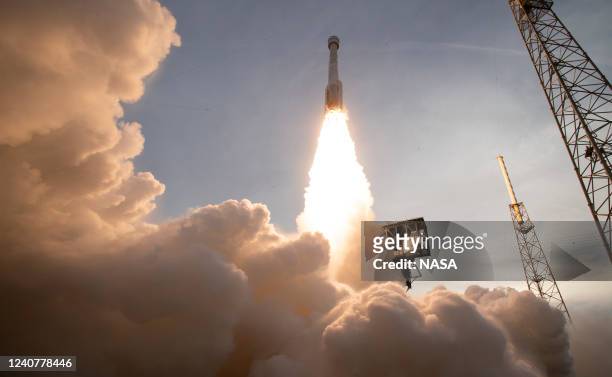 In this handout photo provided by NASA, a United Launch Alliance Atlas V rocket with Boeings CST-100 Starliner spacecraft launches from Space Launch...