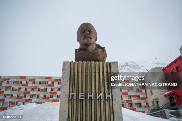 Monument to Lenin is pictured during blizzard on May 7 in the miners' town of Barentsburg, on the Svalbard Archipelago, northern Norway. - War may be...