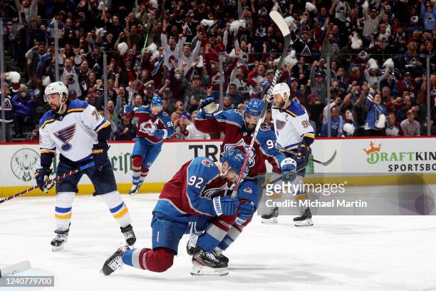 Gabriel Landeskog, Nazem Kadri and Mikko Rantanen of the Colorado Avalanche celebrate a goal against the St. Louis Blues in Game Two of the Second...