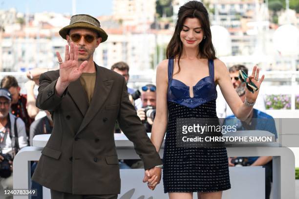 Actor Jeremy Strong and US actress Anne Hathaway pose during a photocall for the film "Armageddon Time" at the 75th edition of the Cannes Film...
