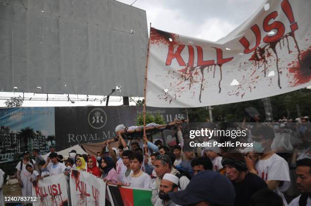 Afghan nationals who fled to Pakistan from Afghanistan after Taliban took over Afghanistan last year hold a protest.. The Afghan protesters demanded...